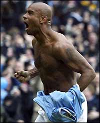 Trevor Sinclair celebrates scoring his side's third goal