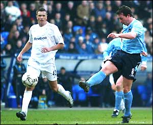 Robiie Fowler scores his second goal for Man City against Bolton