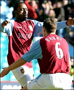 Aston Villa's Darius Vassell and Gareth Barry celebrate a goal