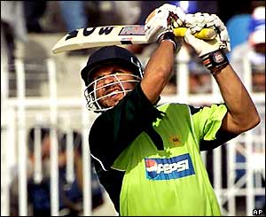 Shahid Afridi smashes the ball away