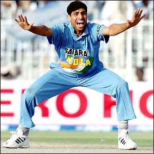Ashish Nehra appeals for lbw against Moin Khan
