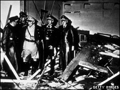 Hermann Goering (second from left) inspects the bomb damage at Rastenberg