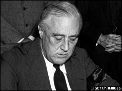 President Roosevelt signs declaration of war against Japan - 8 December 1941