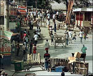 Demonstrators erecting barricades during 2000 election campaign in Port-au-Prince