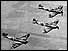 Spitfires flying in formation