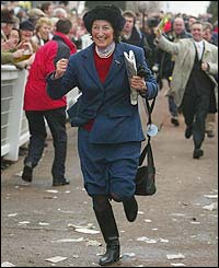 Best Mate's trainer Henrietta Knight races to greet her horse following the success