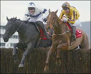 Earthmover clears the last ahead of Never Compromise in the Christie's Foxhunter Chase