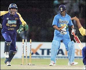 Sachin Tendulkar stares at his stumps after being bowled out by Dilshan