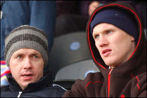 Tyrone and Peter Canavan watch a game from the stand