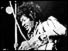 Jimi Hendrix playing guitar