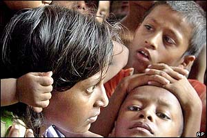 Bangladeshi children afflicted by waterborne diseases resulting from floods