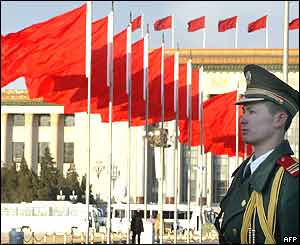 A Chinese paramilitary guard stands at attention on Tiananmen Square