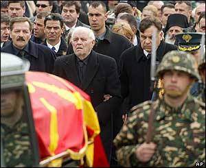 Mr Trajkovski's father walks behind his coffin