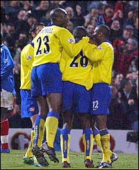 Arsenal celebrate Kolo Toue's goal