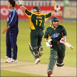 Azhar Mahmood watches as the winning boundary comes off his delivery