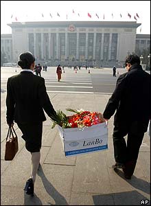 In Beijing, flowers were being distributed to female delegates at the National People's Congress at the Great Hall of the People.