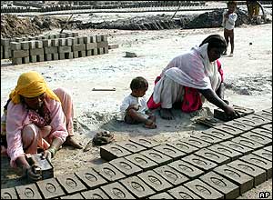 Women at this brick kiln in Multan, Pakistan, earn US$2 for 1,000 bricks 