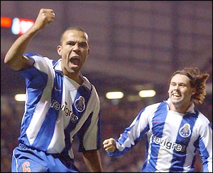 Francisco Costinha celebrates his late equaliser as Porto knock Manchester United out of the Champions League 