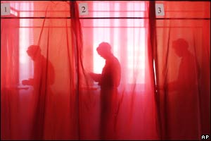 Russian soldiers fill in their ballots for the presidential election. 