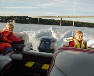 Richard Perks' twin daughters Megan and Ffion are pictured travelling past Hobbs Point, Pembroke Dock on the Cleddau Estuary