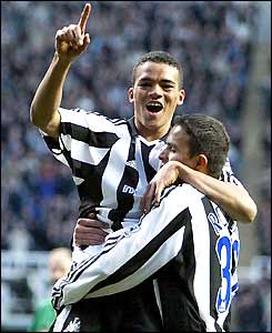 Jermaine Jenas and Laurent Robert celebrate Newcastle's second goal