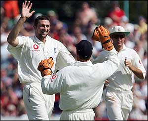 Stephen Harmison celebrates claiming the wicket of Sylvester Joseph