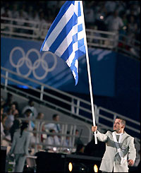 Pyrros Dimas heads the procession of athletes from all around the world