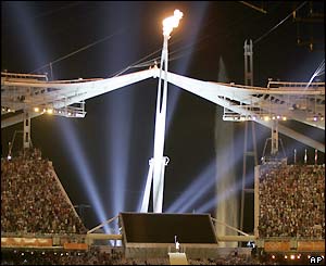 The Olympic flame burns brightly for all the stadium to see