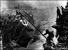 Red Army soldiers raise Red Flag over Reichstag, taken 30 April 1945