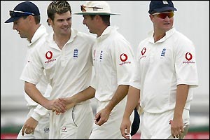 James Anderson is congratulated by his captain Michael Vaughan as the combine to claim the final wicket
