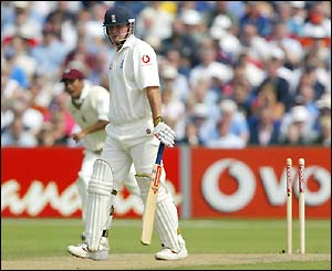 Robert Key leaves his shattered stumps behind as he makes only six runs and leaves England on 13-2