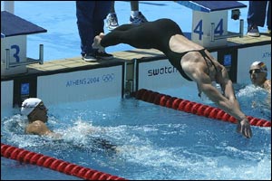 Melanie Marshall dives into the pool, following legs by Karen Pickering (left), Alison Sheppard and Kathryn Edwards