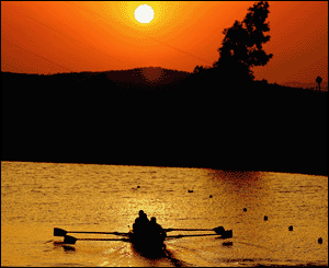 A men's lightweight fours team warms down on a beautiful morning in Greece