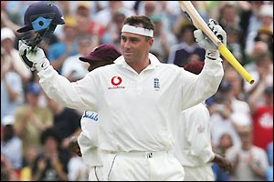 Graham Thorpe celebrates his century during a 56-run partnership with nightwatchman Matthew Hoggard