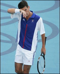 Tim Henman crashes out of the Olympics