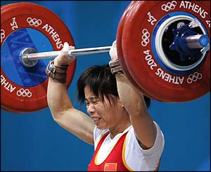 Chen Yanqing grimaces as she attempts to break the world record