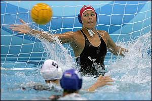 Hungary's goalkeeper Ildiko Zirighne Sos tries to block a shot 