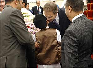 Tony Blair met by Libyan boy