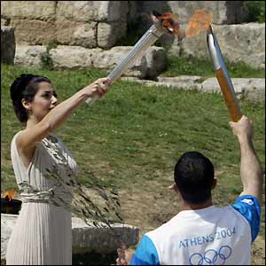 Greek actress Thalia Prokopiou lights the Olympic torch at the Temple of Hera