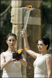 Greek actress Thalia Prokopiou lifts the torch