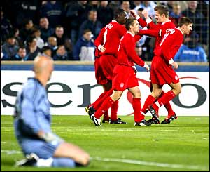 Fabien Barthez watches Liverpool celebrate their opening goal