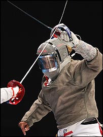 US gold medalist Mariel Zagunis fights with Chinese Tan Xue 