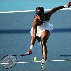 Venus Williams returns a shot