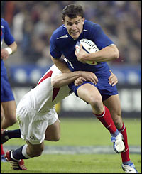 Damien Traille attempts to fashion an early score for France