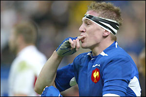 Flanker Imanol Harinordoquy celebrates after scoring the first try of the night