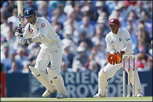 Michael Vaughan completes his 50 during the final session