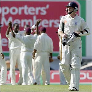 Ian Bell makes 70 off 130 balls before being caught by wicket-keeper Carlton Baugh
