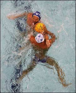 Australia's Nathan Thomas (top) and Spain's Gustavo Marcos clash