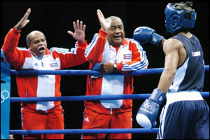Yuriokis of Cuba is congratulated by his corner men