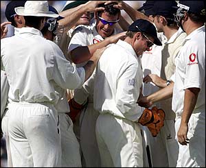 Ashley Giles is congratulated after ousting Shivnarine Chanderpaul